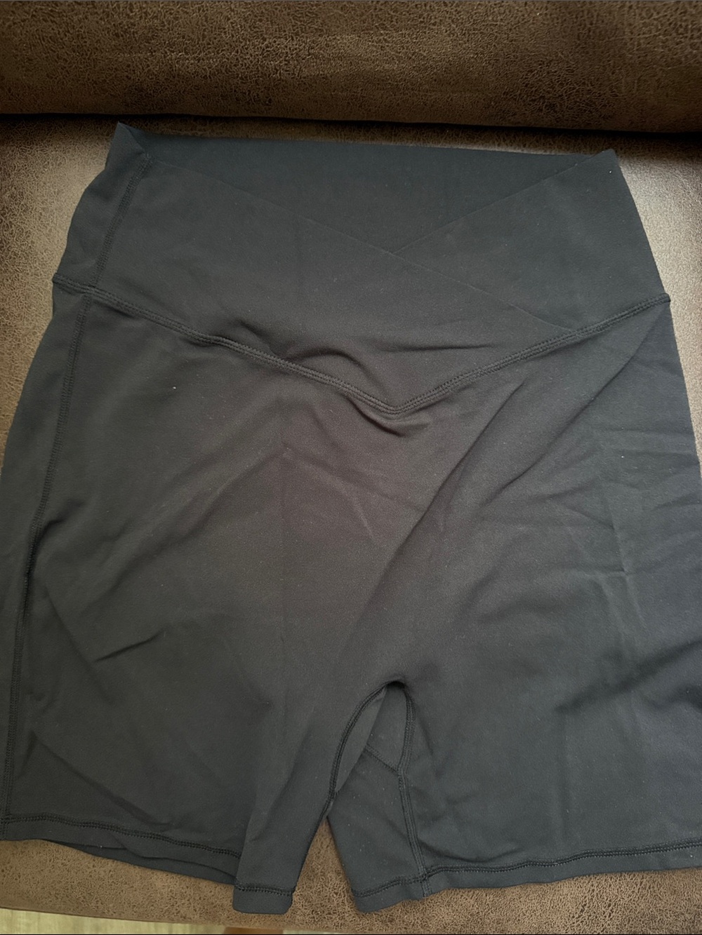 High-Waist Black Athletic Bike Shorts and gray sports bra